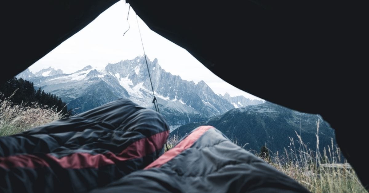 couple waking up camping