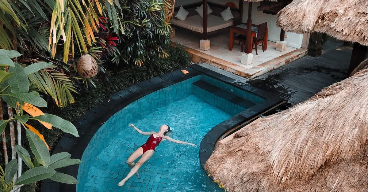 Woman swimming in a pool in bali
