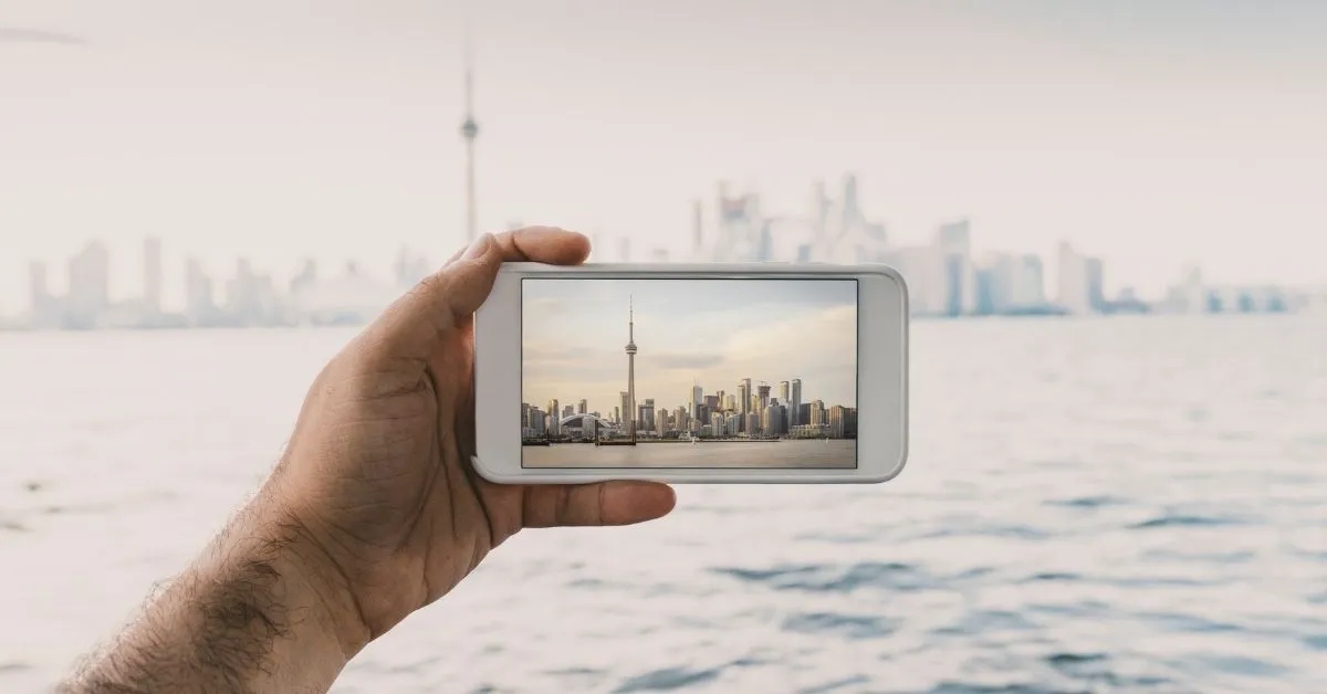 traveler with a phone in canada