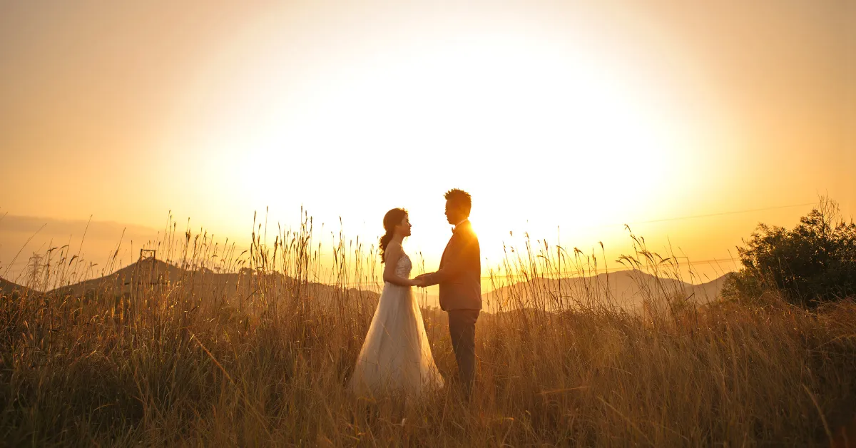 couple eloping in california coast during sunset