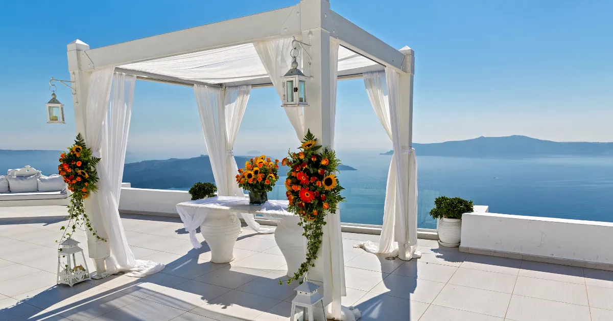 elopement set canopy up overlooking the sea