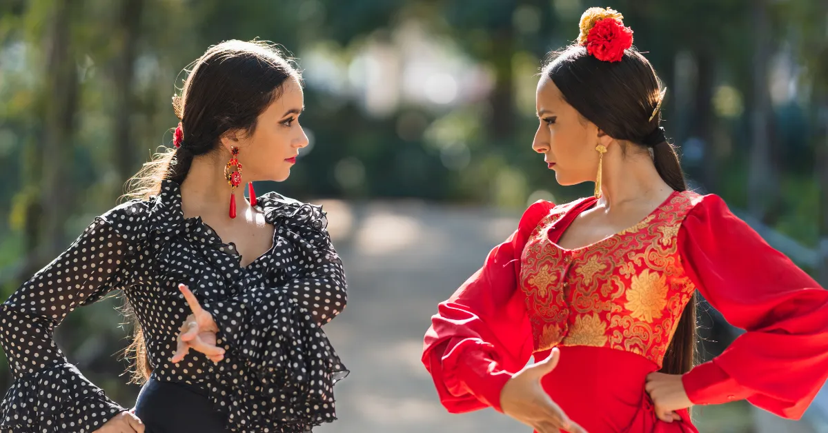 girls from spain in traditional flamenco show dresses