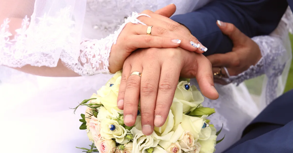 bridge and groom holding boquet