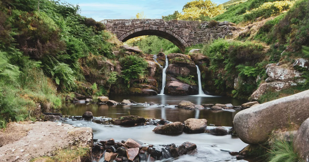 three shires head bridge and waterfall