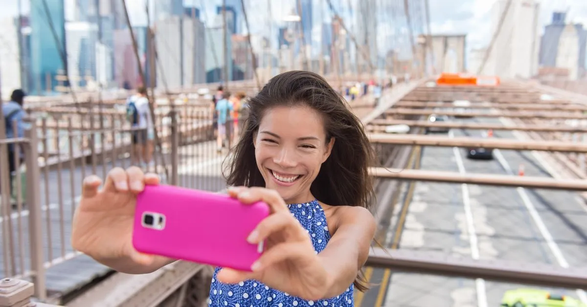 A woman takes a selfie in New York