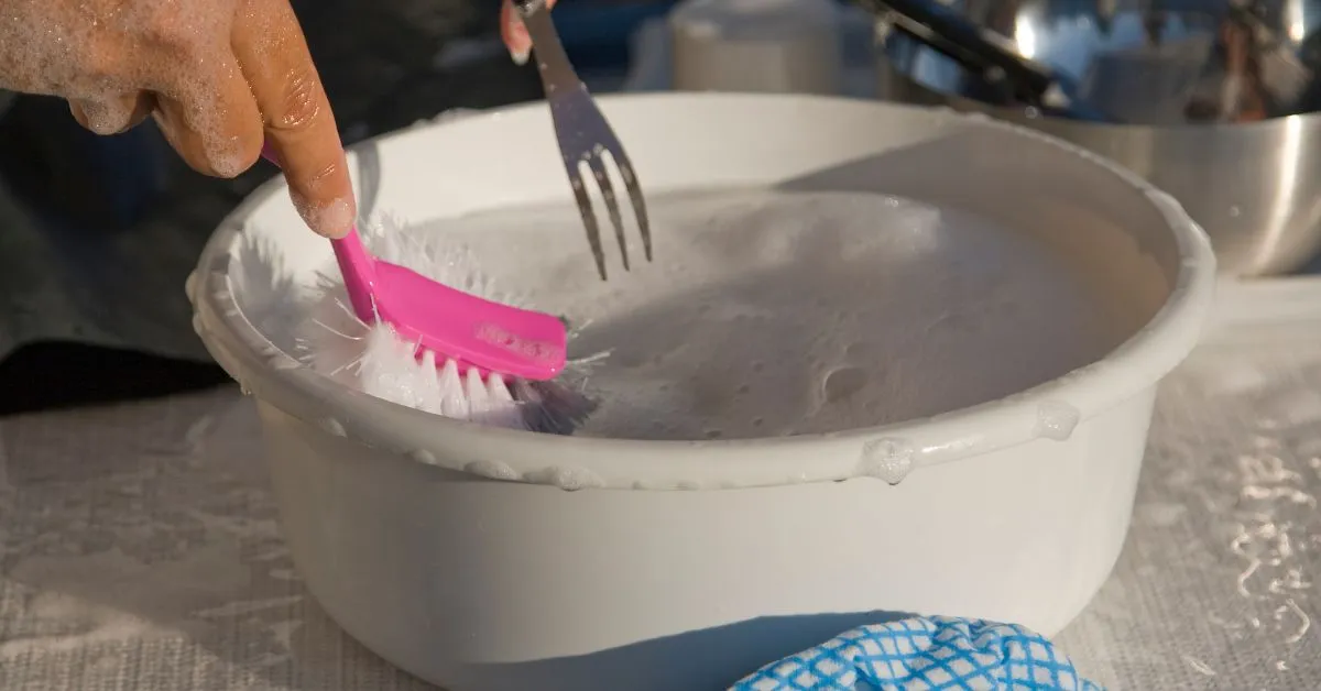 cleaning dishes when camping