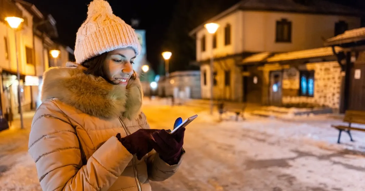 Woman on her phone in Bansko in Bulgaria