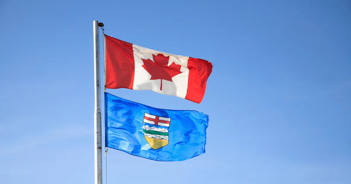 Alberta flag under Canadian flag