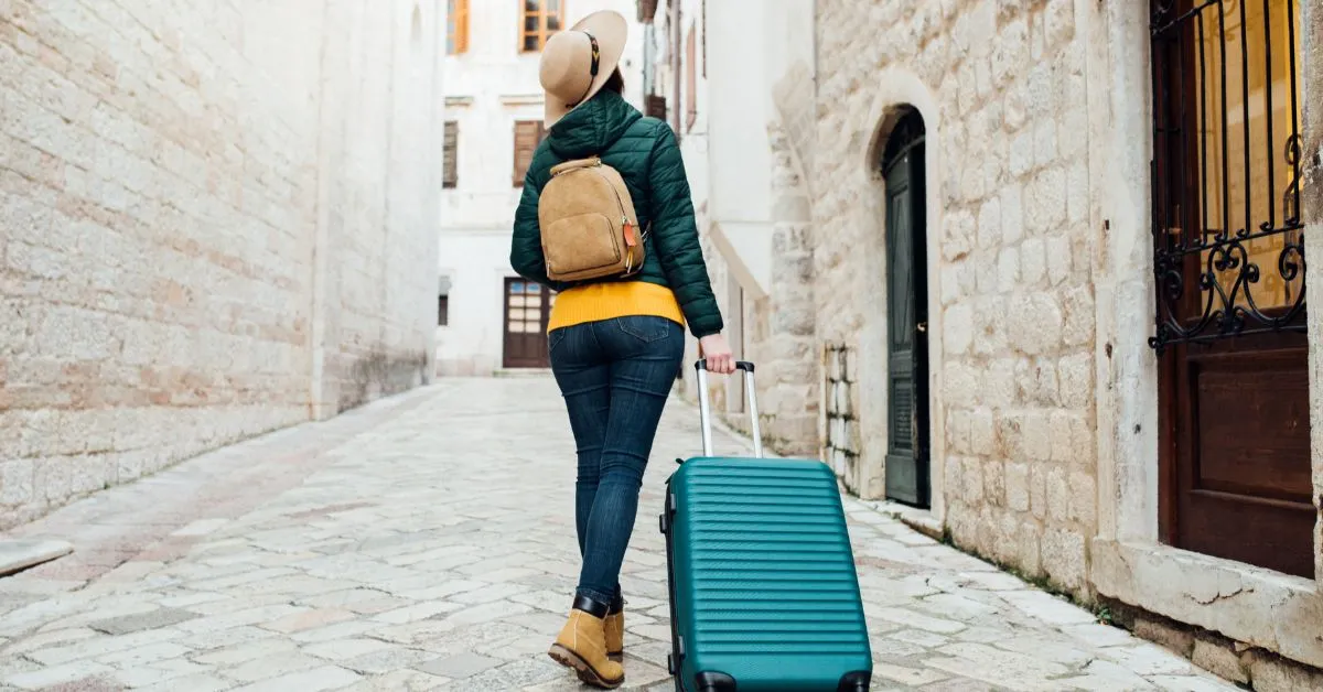 Woman with a luggage