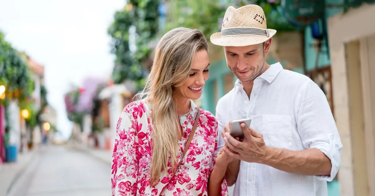 Tourist couple with phone