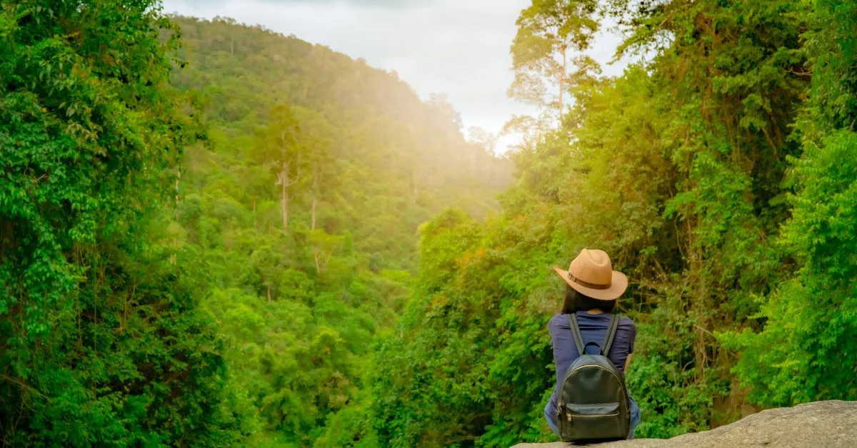 Woman traveling alone in the woods