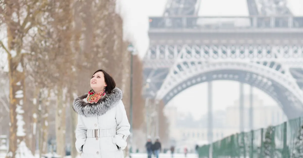 Woman traveling in Paris during winter
