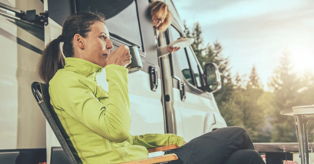 Rv campers eating and drinking coffee